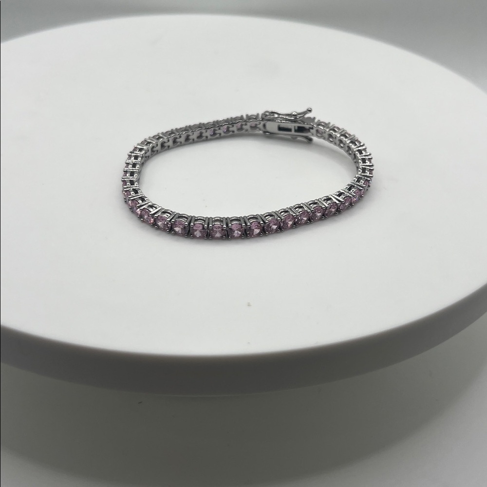 433. Elegant Silver and Pink Tennis Bracelet